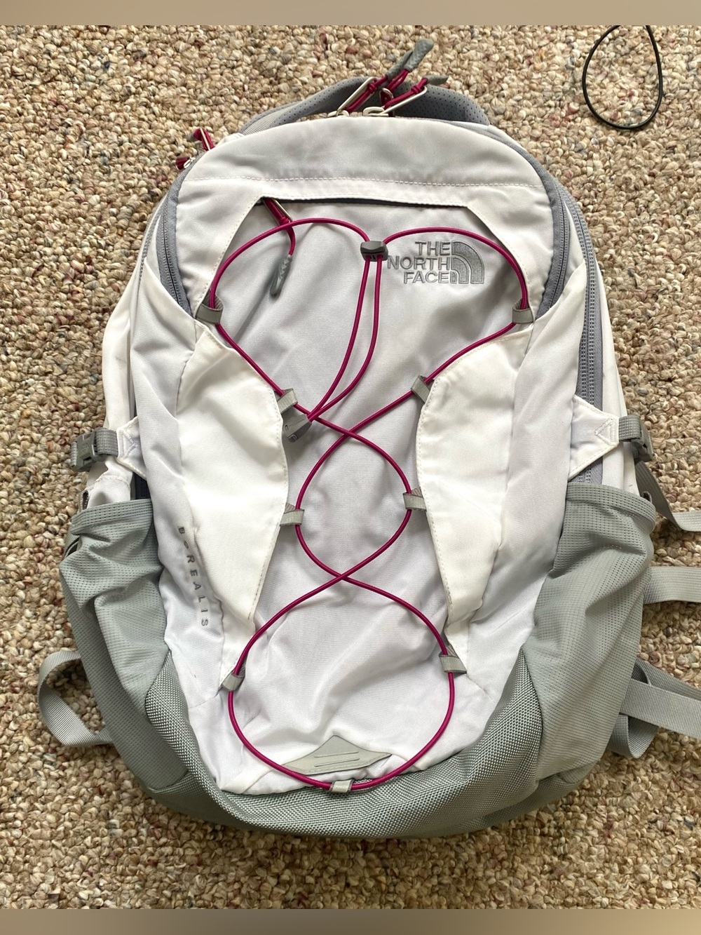 The North Face Borealis Backpack in a white and pink/plum colorway